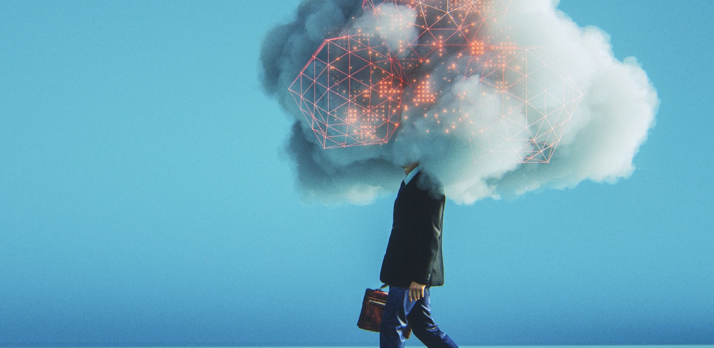 Buisness man with his head in a digital cloud