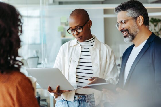 Photo of woman looking at computer