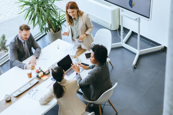 Business people around table